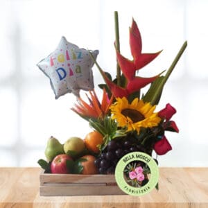 Arreglo Floral con Frutas, Rosas Rosadas y girasol
